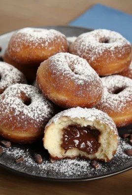 Comment préparer des beignets fourrés à la crème de noisette