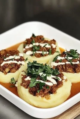 Purée de pommes de terre farci à la viande